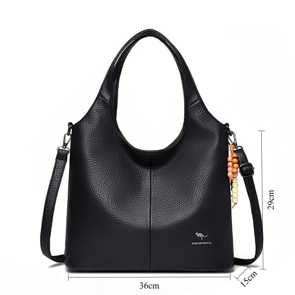 Sac seau femme souple à pompon – CLEVI Paris