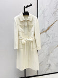 Manteau long femme en laine à quatre poches – CLEVI Paris