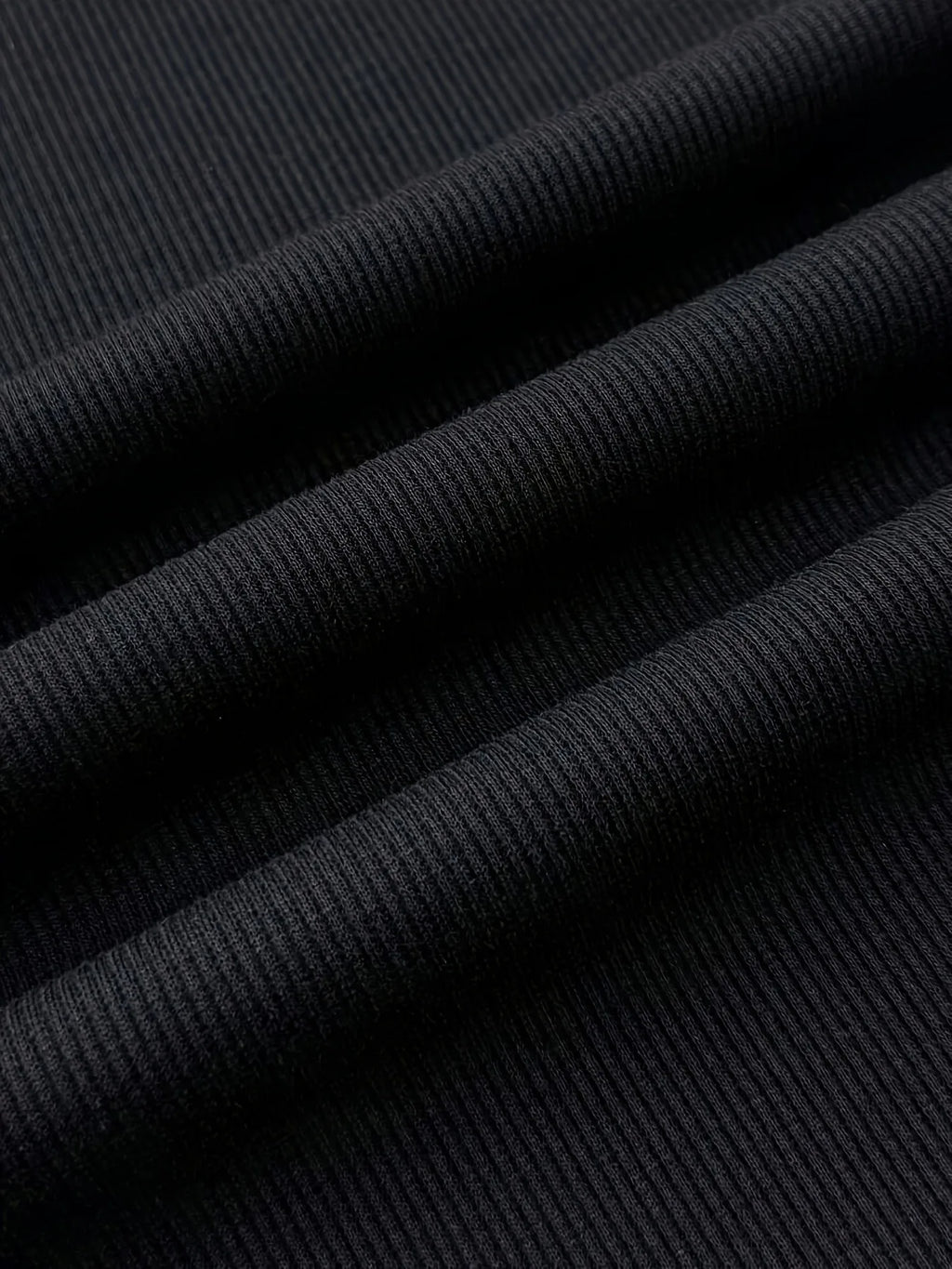Robe polo fille en noire à motif nœud – CLEVI Paris