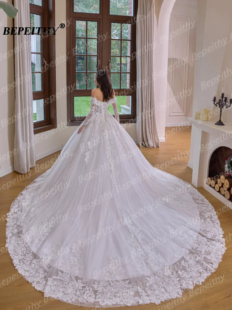 Robe de mariée ligne A en tulle et dentelle - CLEVI Paris