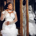 Robe de cocktail en dentelle à plumes – CLEVI Paris