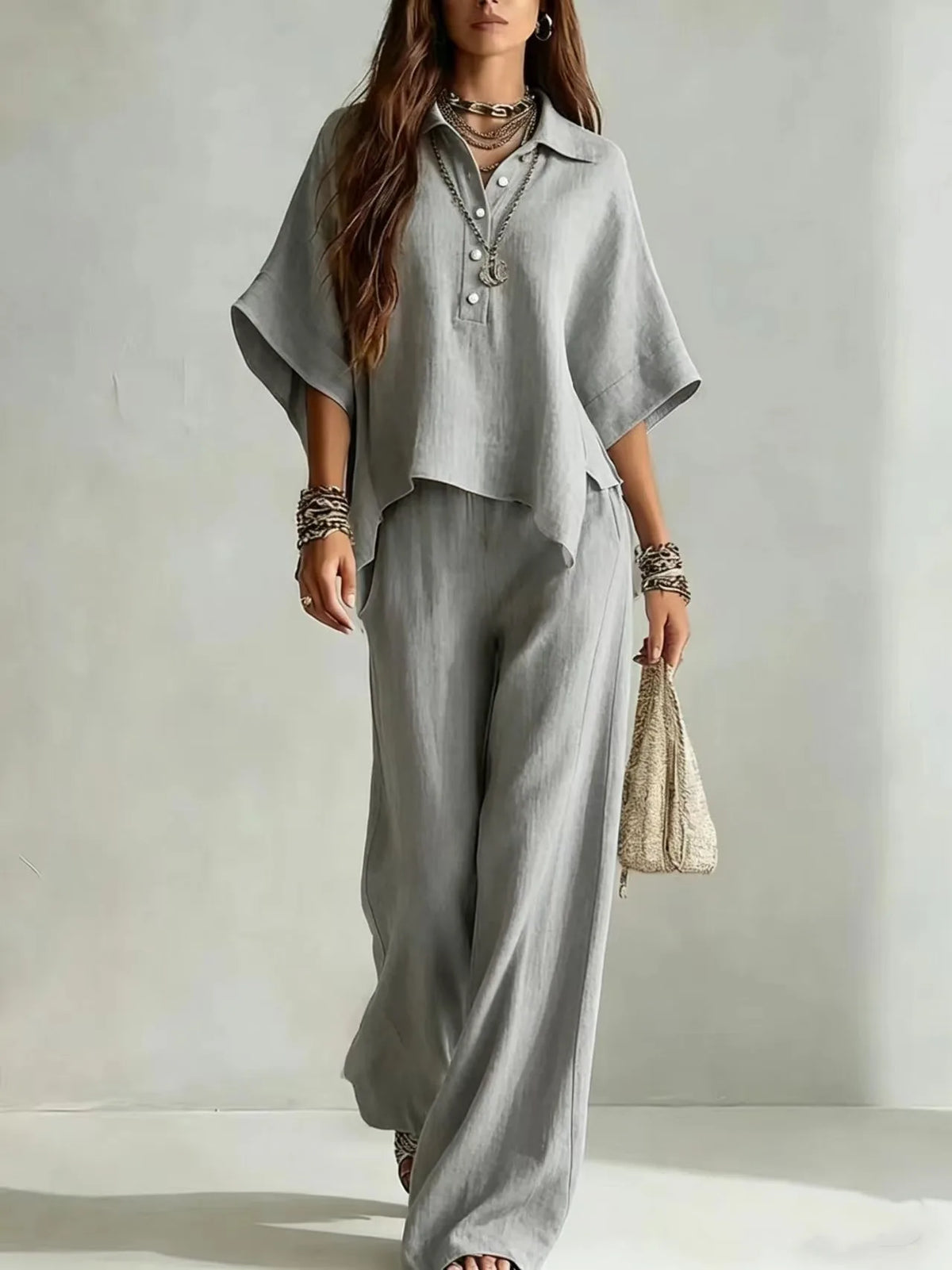 Ensemble femme haut col V et pantalon large – CLEVI Paris