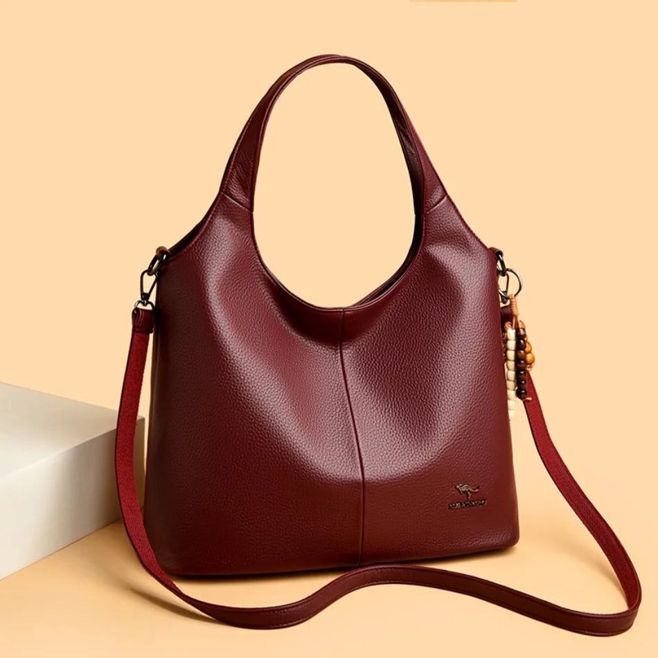 Sac seau femme souple à pompon – CLEVI Paris