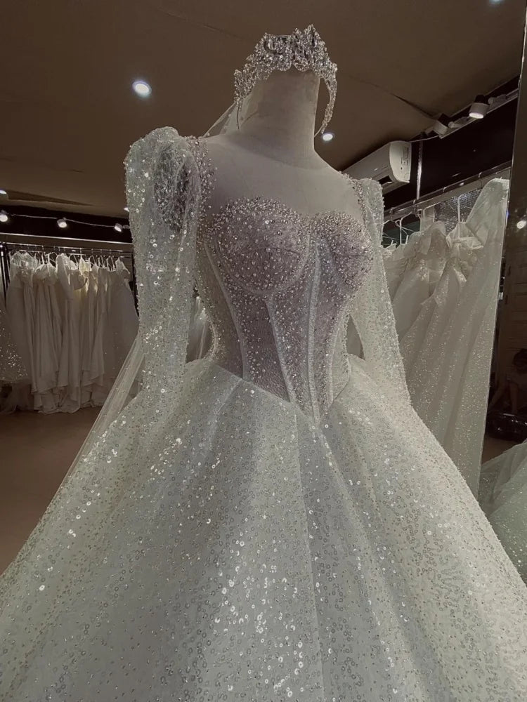 Robe de mariée en tulle perlée – CLEVI Paris