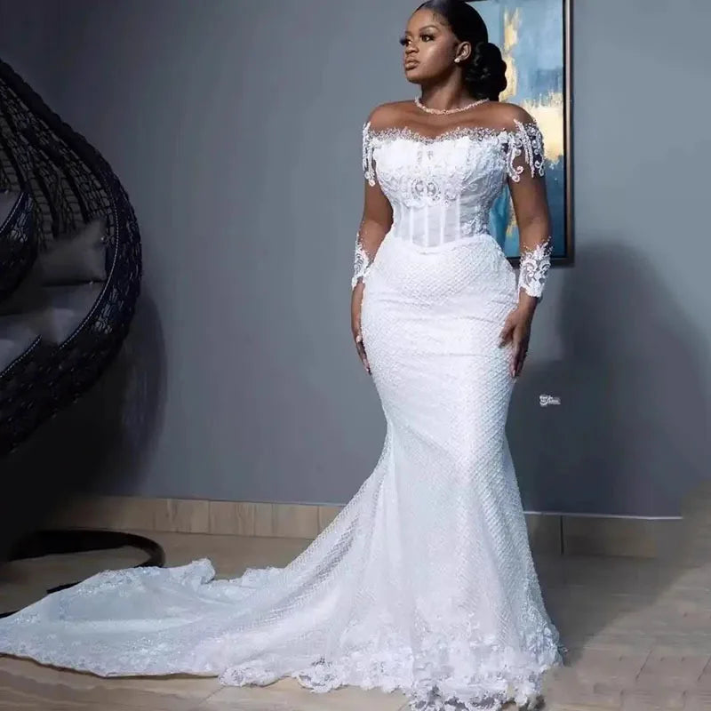 Robe de mariée sirène à manches longues – CLEVI Paris