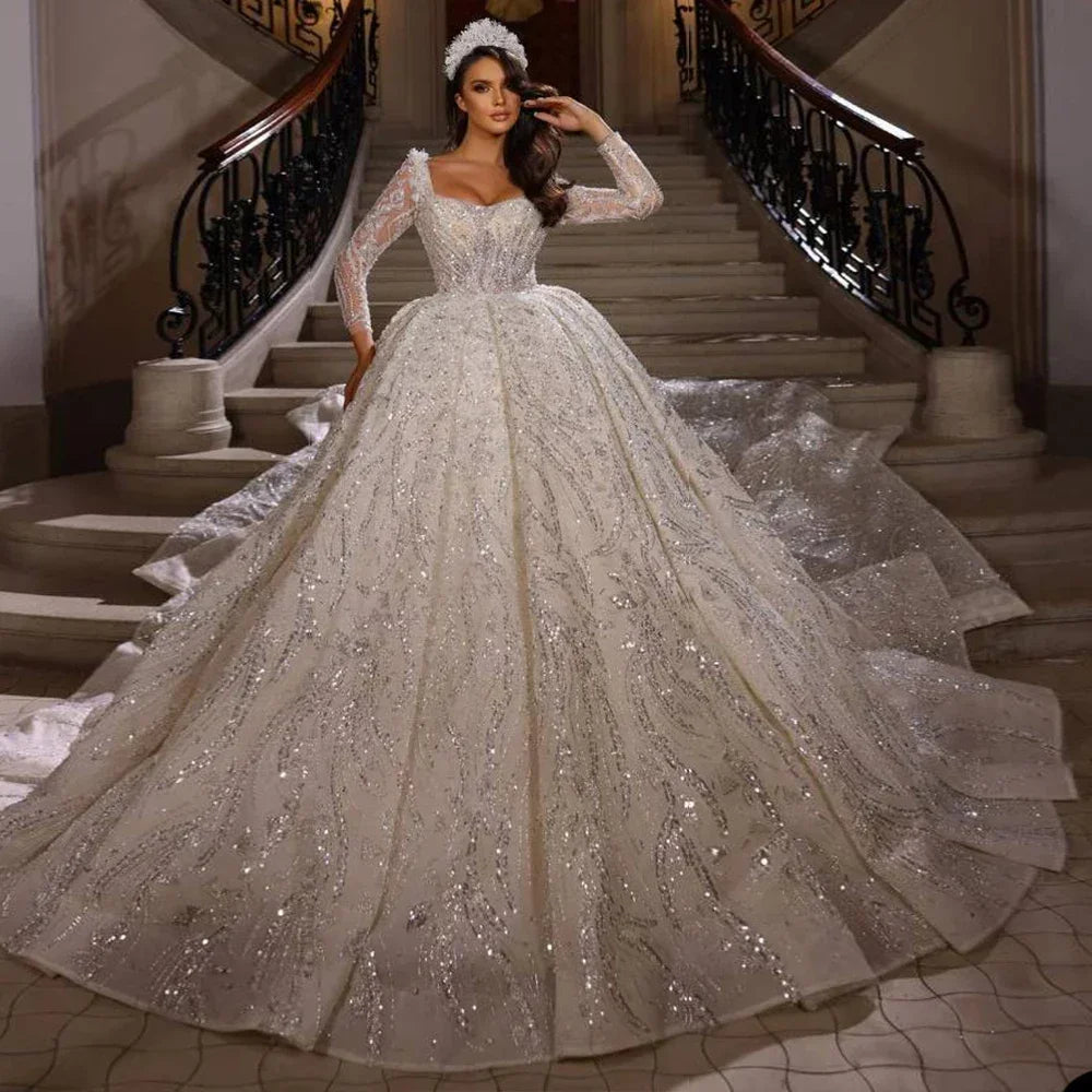 Robe de mariée en dentelle perlée – CLEVI Paris