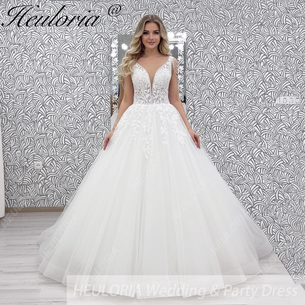 Robe de mariée ligne A en dentelle à perles – CLEVI Paris