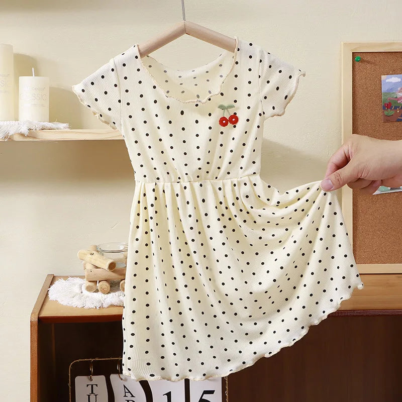 Robe fille à pois et manches courtes – CLEVI Paris