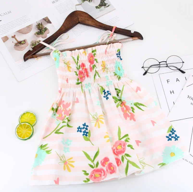 Robe fille d’été à motif floral – CLEVI Paris