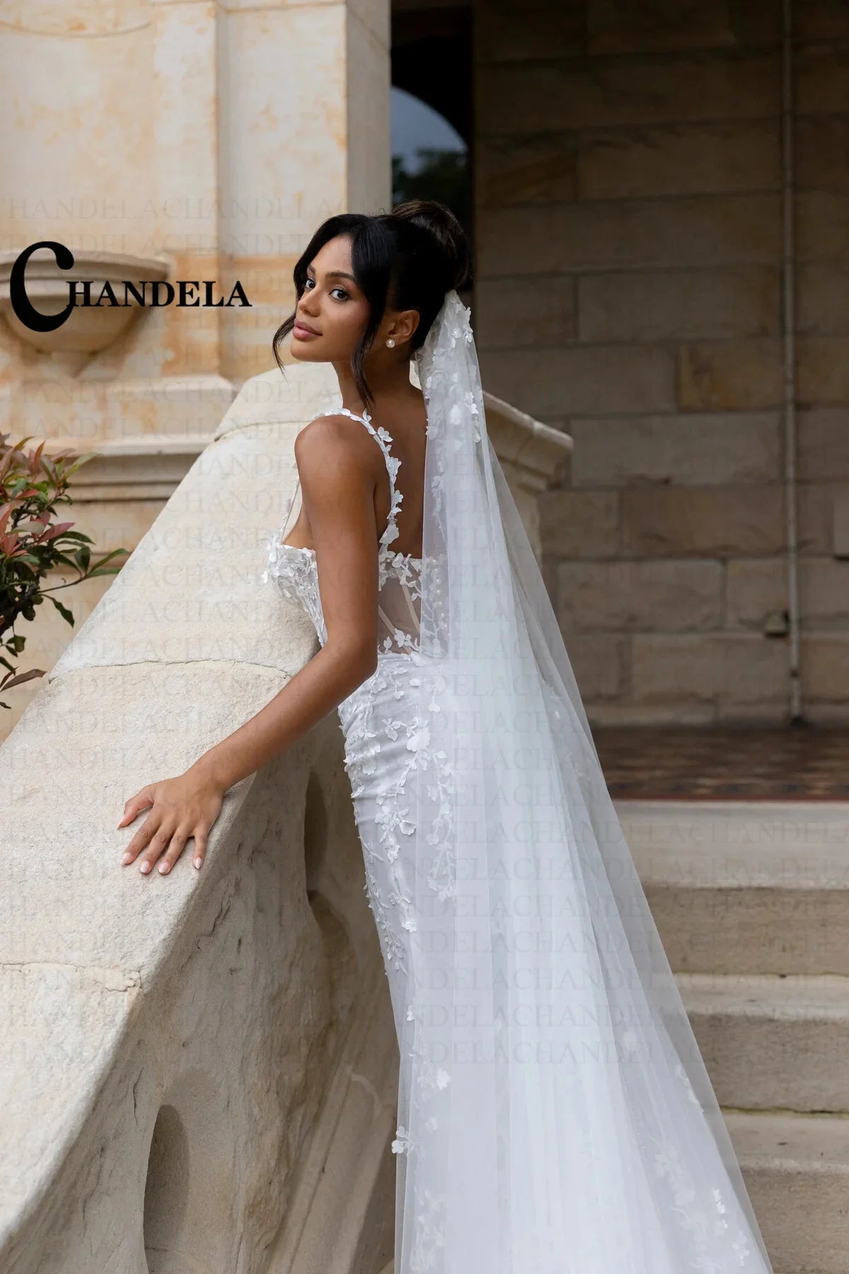 Robe de mariée sirène à appliqués – CLEVI Paris