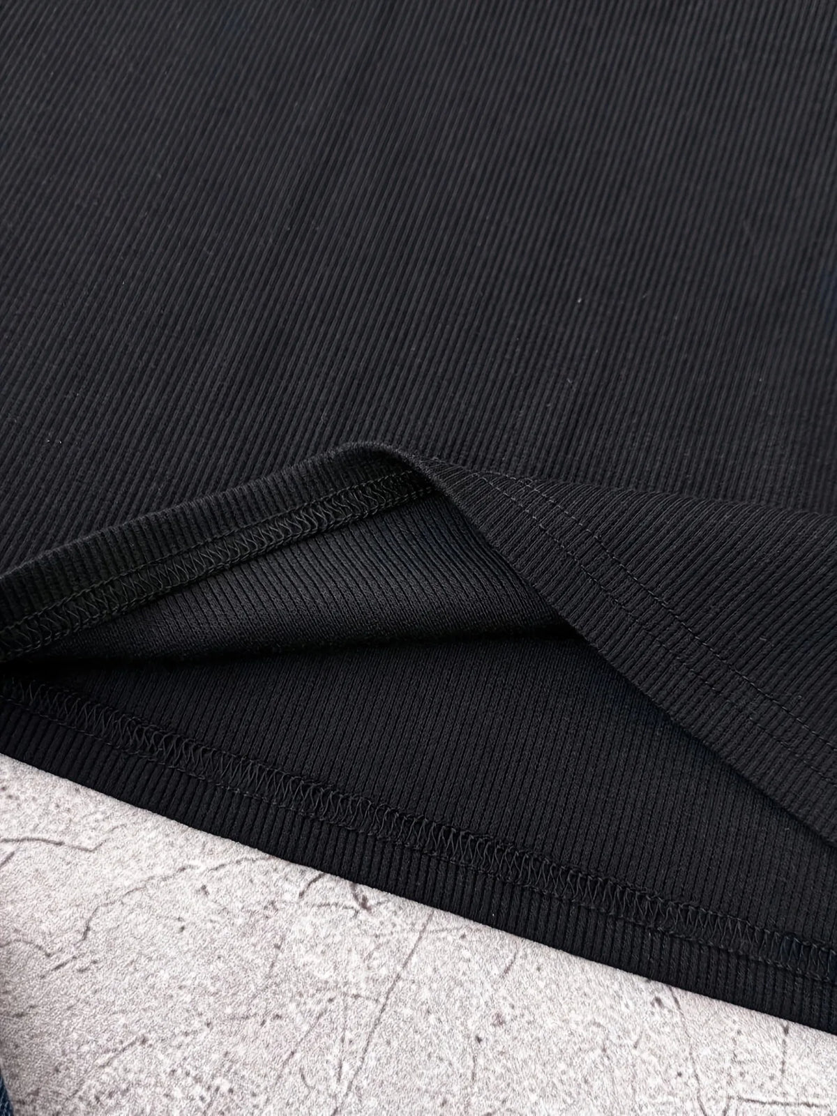 Robe polo fille en noire à motif nœud – CLEVI Paris