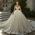 Robe de mariée épaules nues perlée – CLEVI Paris