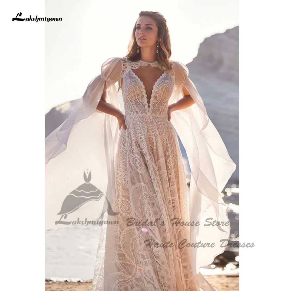 Robe de mariée bohème en tulle, dentelle et col V - CLEVI Paris