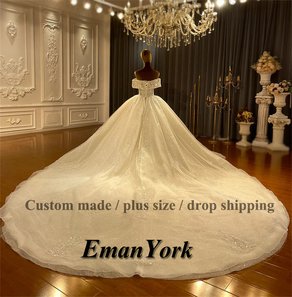 Robe de mariée épaules nues en tulle – CLEVI Paris