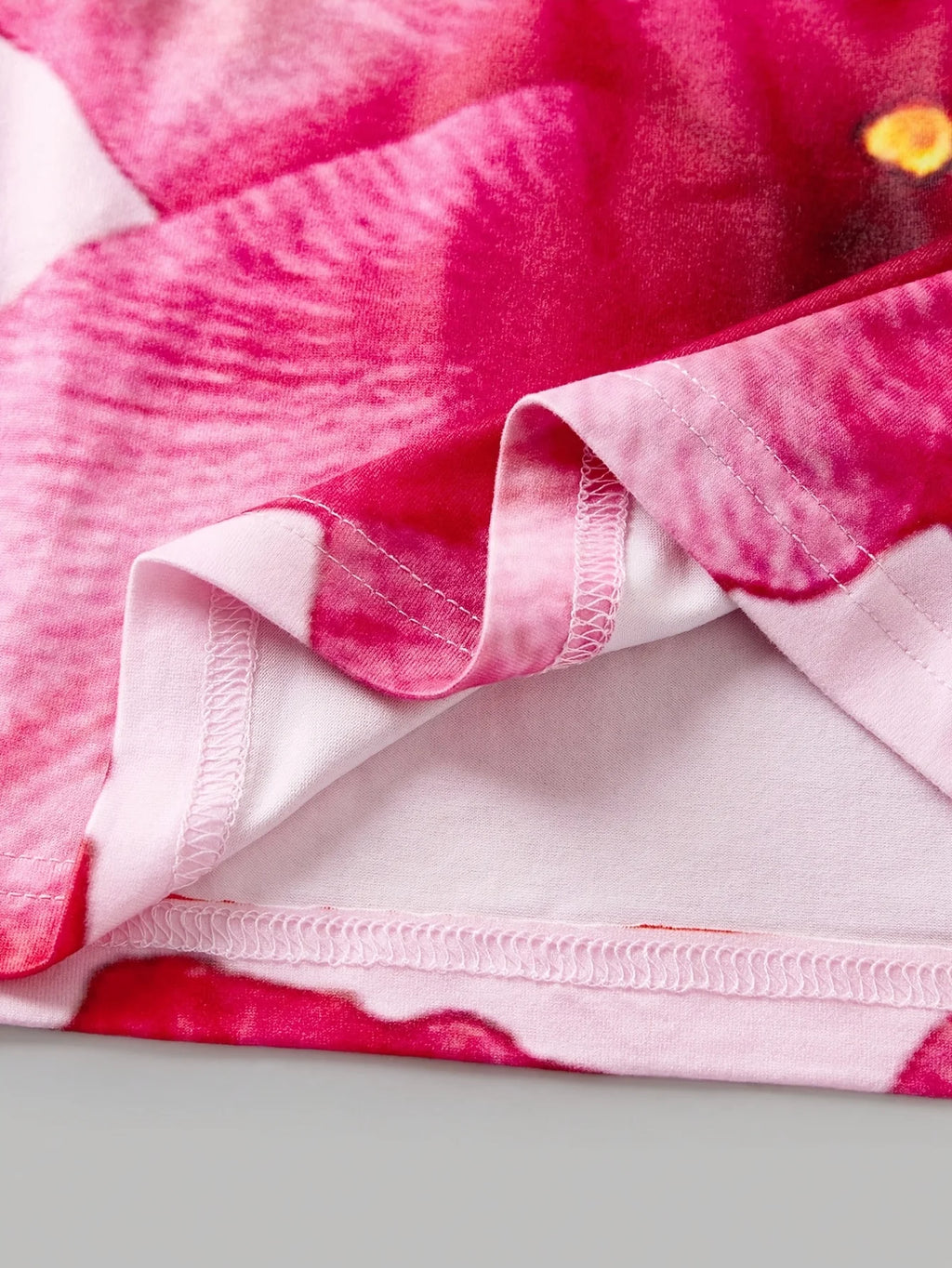 Robe fille rose à fleurs et bretelles – CLEVI Paris