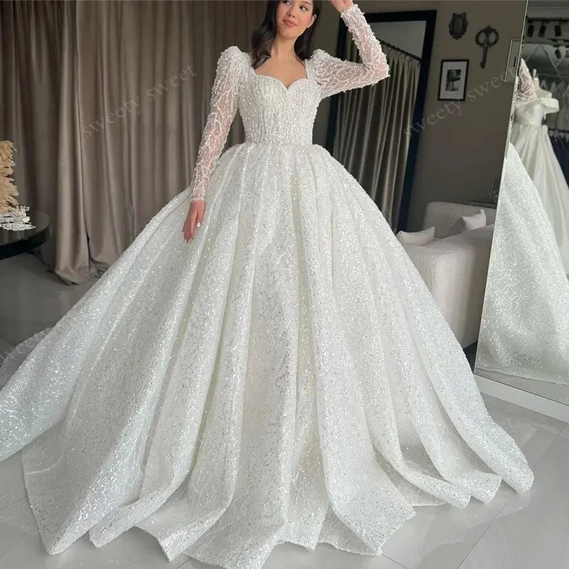 Robe de mariée princesse perlée – CLEVI Paris