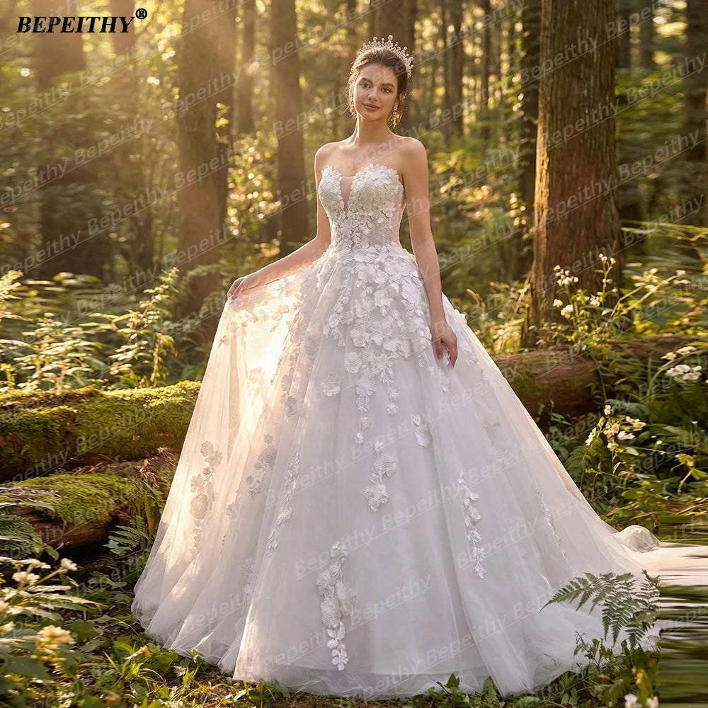 Robe de mariée bohème à fleurs – CLEVI Paris