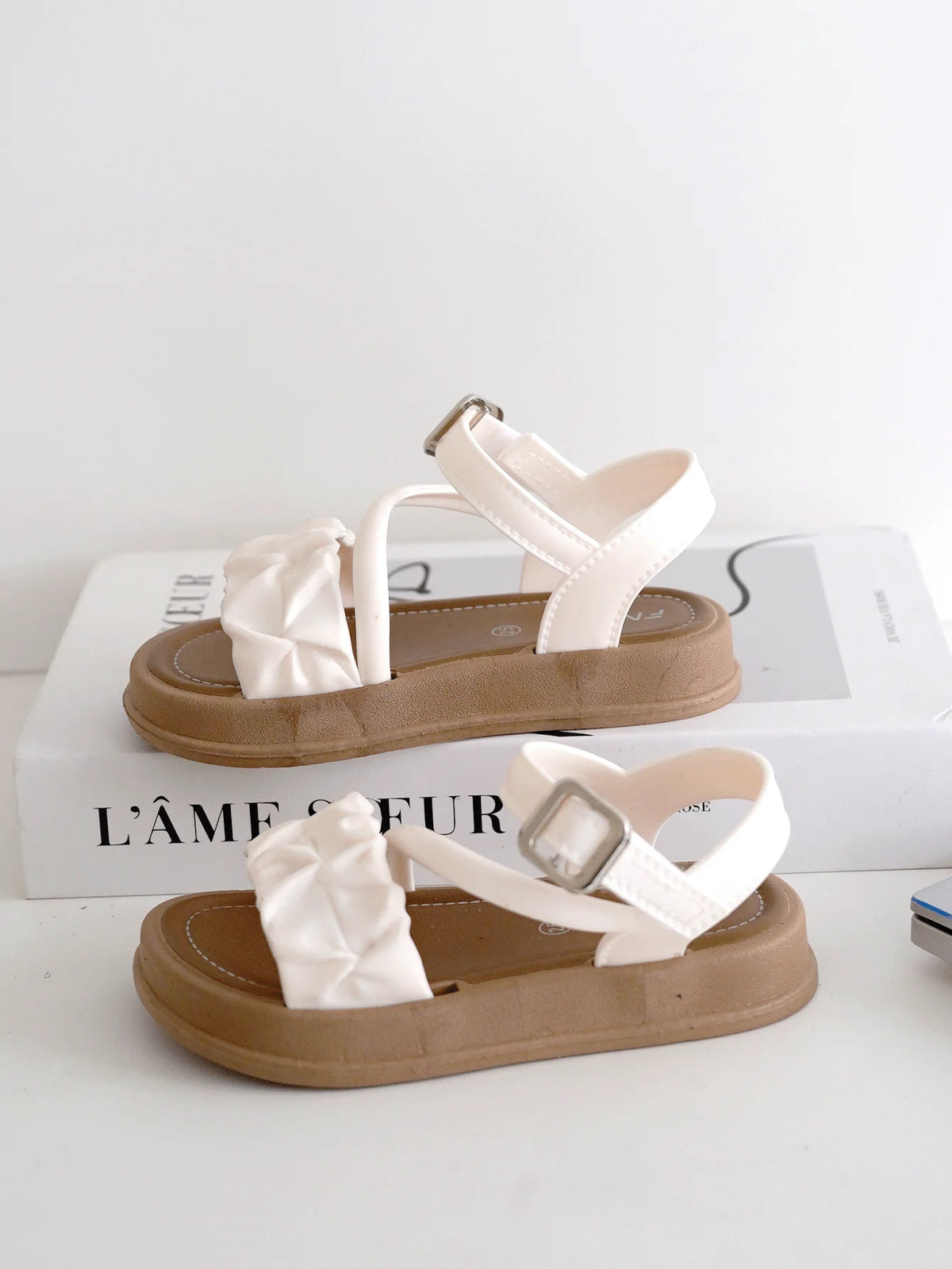 Chaussons fille à nœud en PVC – CLEVI Paris