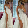 Robe de mariée fendue en tulle – CLEVI Paris