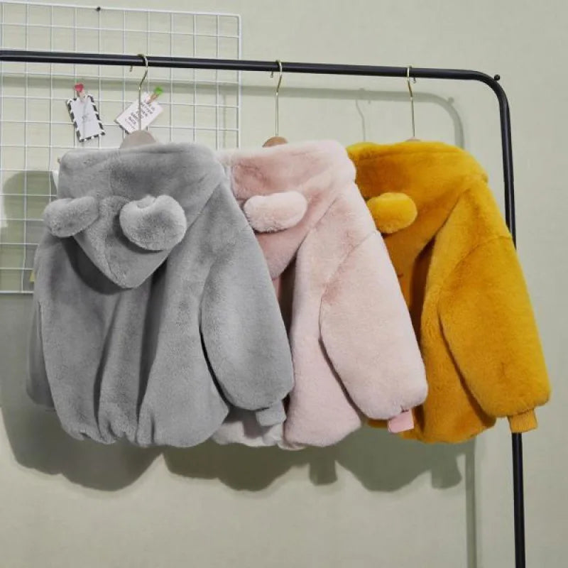 Veste enfant fausse fourrure à capuche – CLEVI Paris