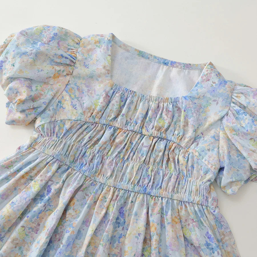 Robe fille bleue fleurie à manches courtes – CLEVI Paris