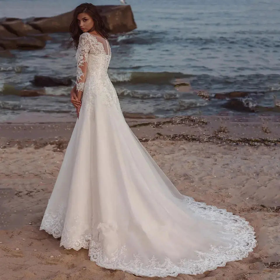 Robe de mariée ligne A tulle col V – CLEVI Paris