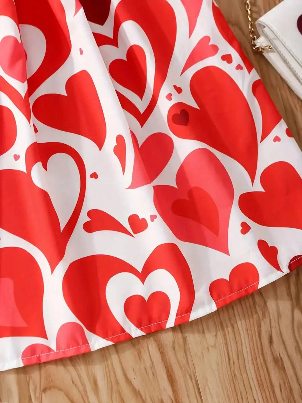 Robe fille rouge à cœurs sans manches – CLEVI Paris