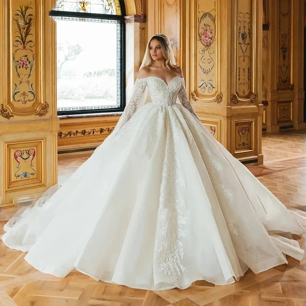 Robe de mariée en tulle brodé – CLEVI Paris