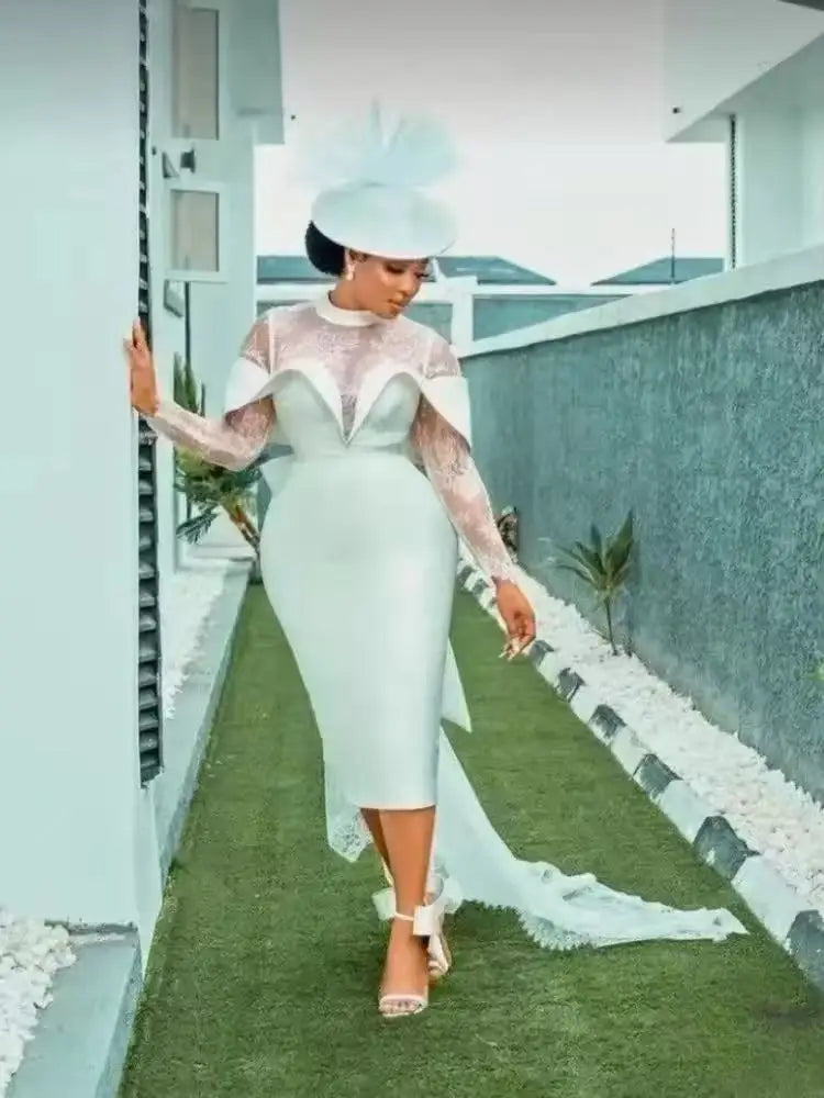 Robe de mariée en dentelle longueur thé – CLEVI Paris