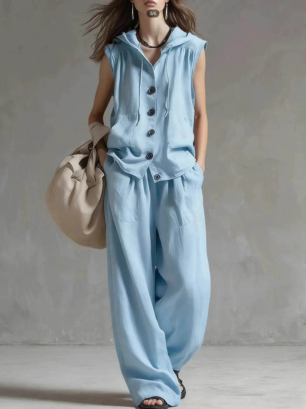 Ensemble femme haut à capuche et pantalon large – CLEVI Paris