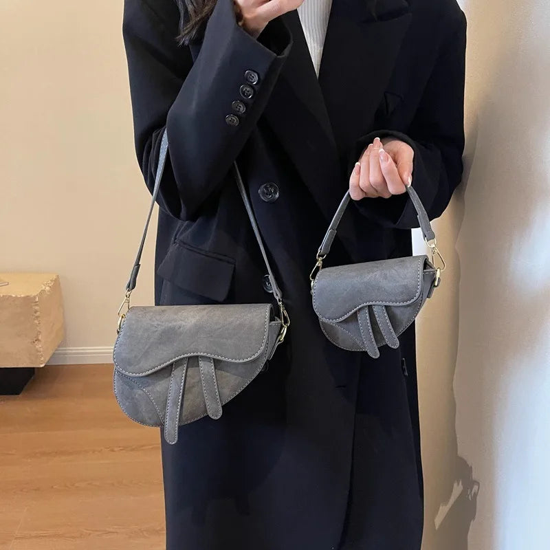 Sac bandoulière femme forme selle – CLEVI Paris