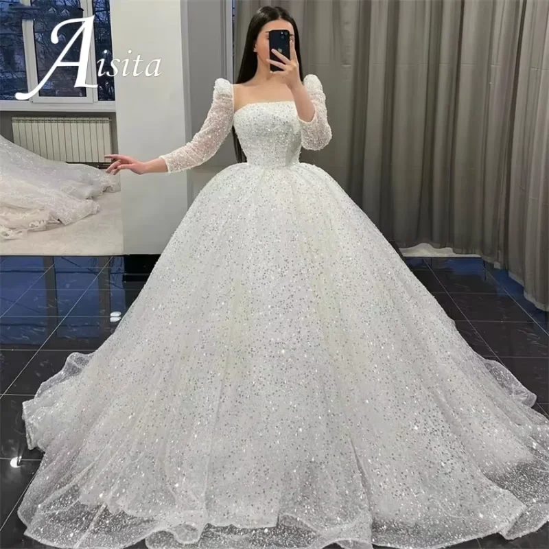 Robe de mariée trapèze perlée à dos ouvert – CLEVI Paris