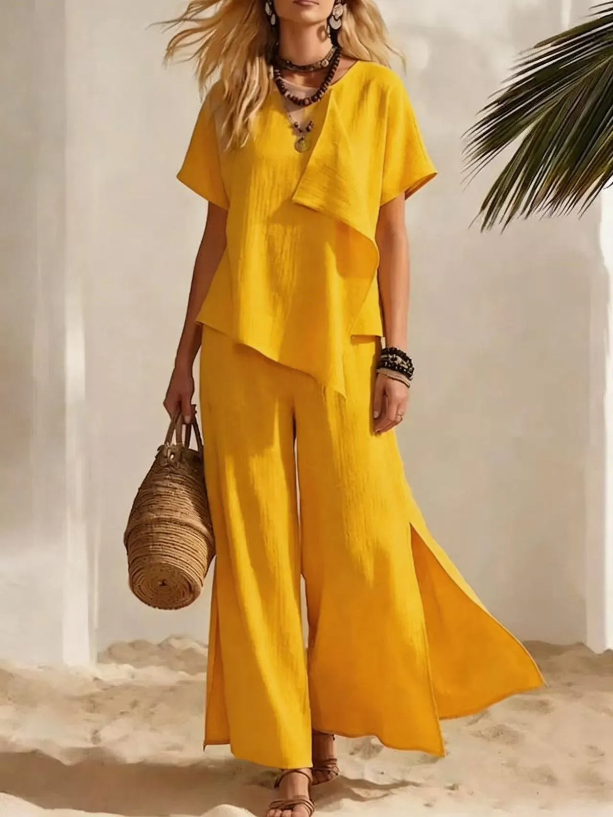 Ensemble femme haut asymétrique et pantalon – CLEVI Paris