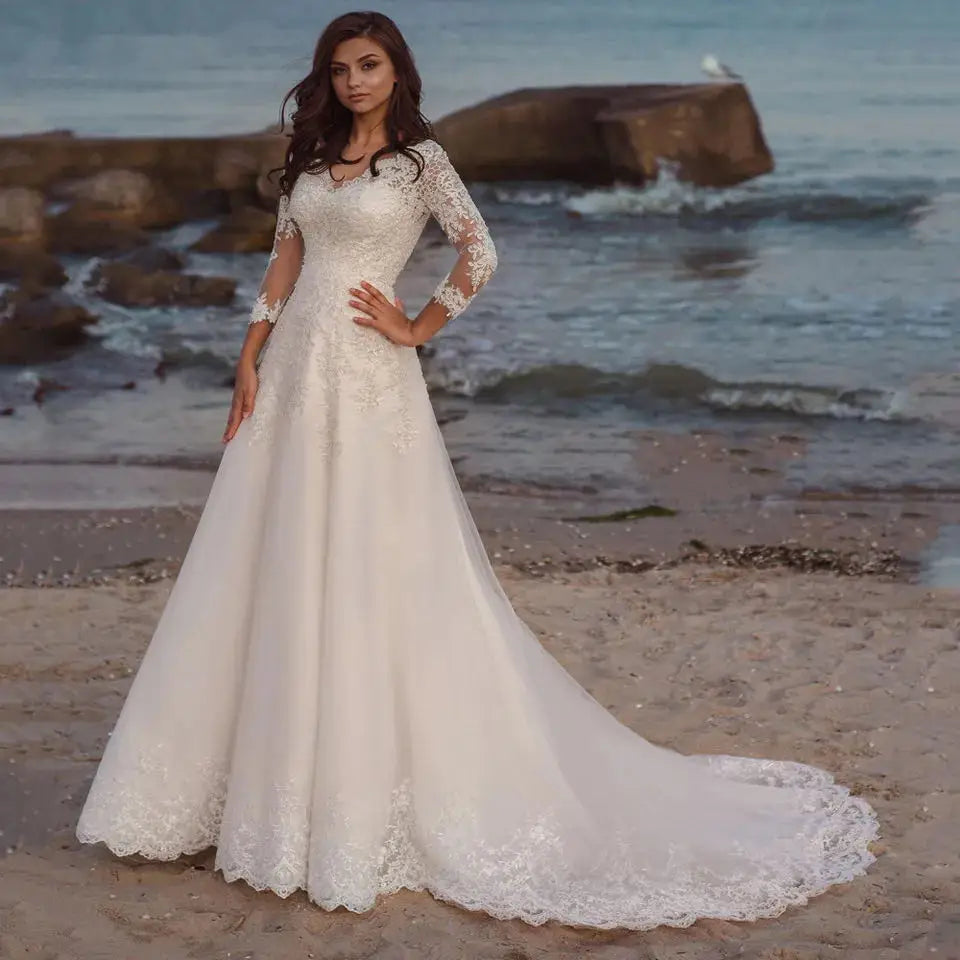 Robe de mariée ligne A tulle col V – CLEVI Paris